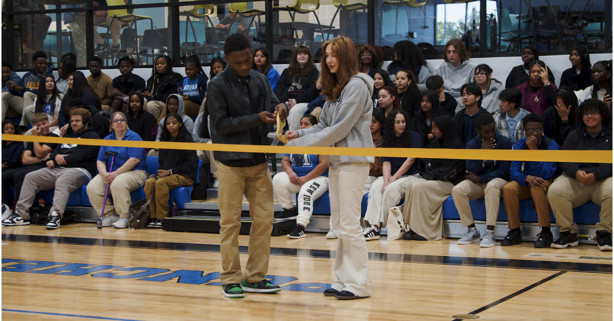 students at ribbon cutting